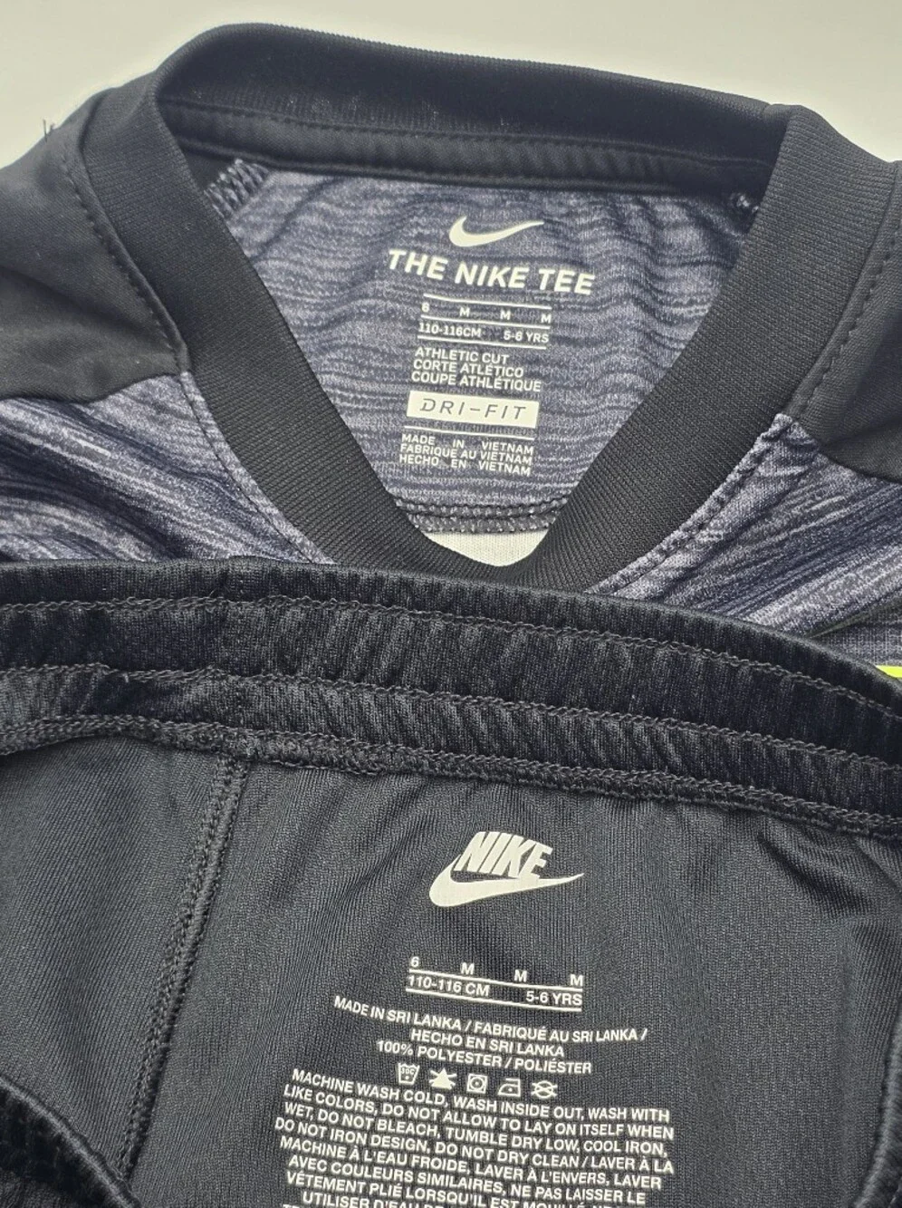 Nike boys' Dri-Fit tee and black athletic shorts size 6
